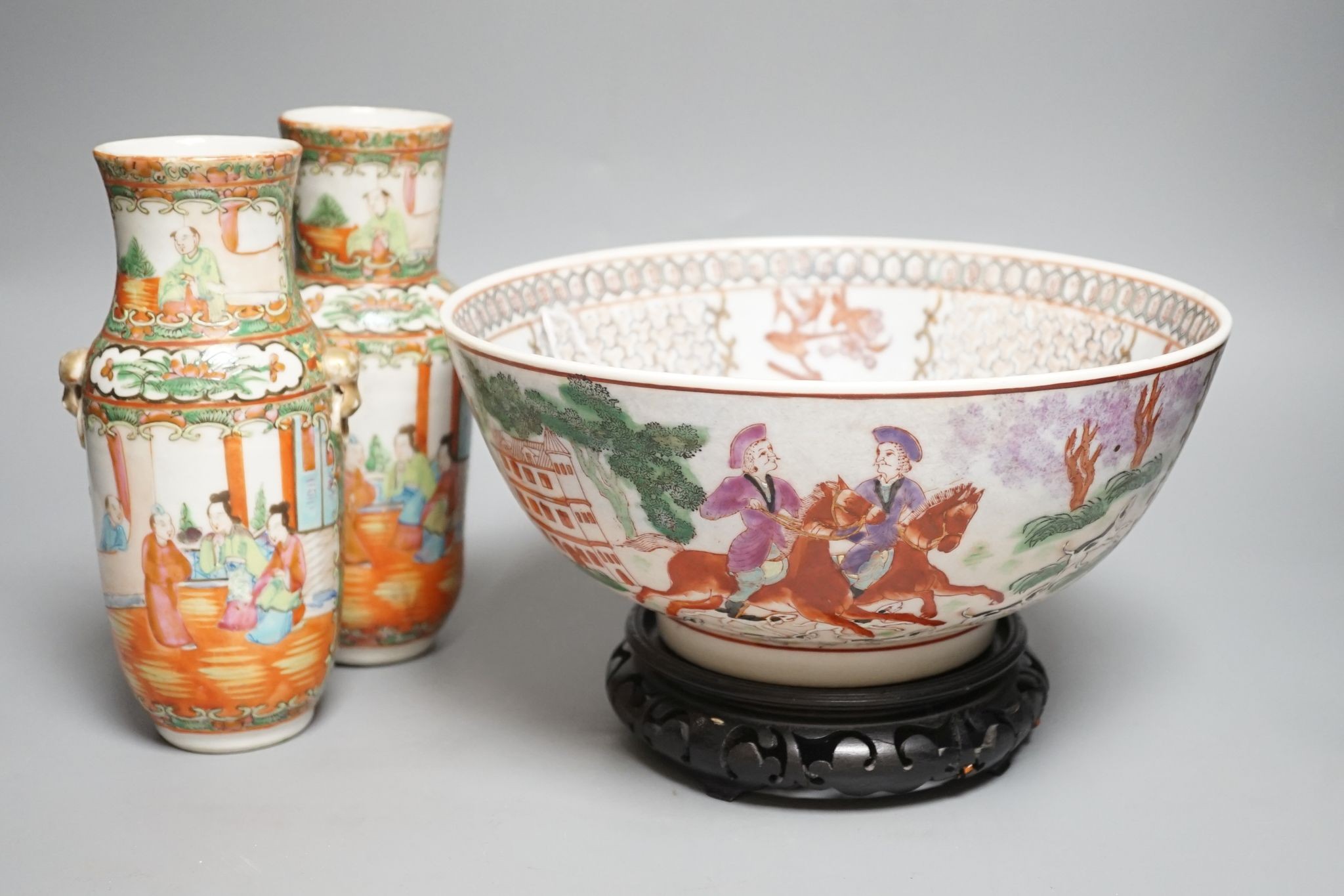 A pair of Chinese Canton famille rose vases and a bowl on stand